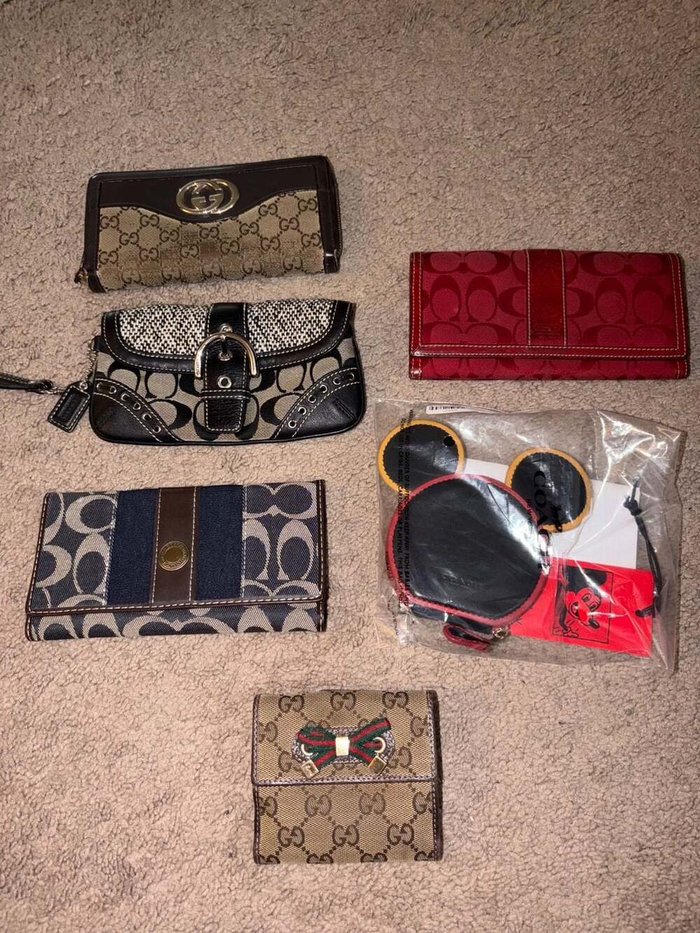 Collection of 6 Designer Wallets and Accessories: Gucci, Coach, and Disney x Coa